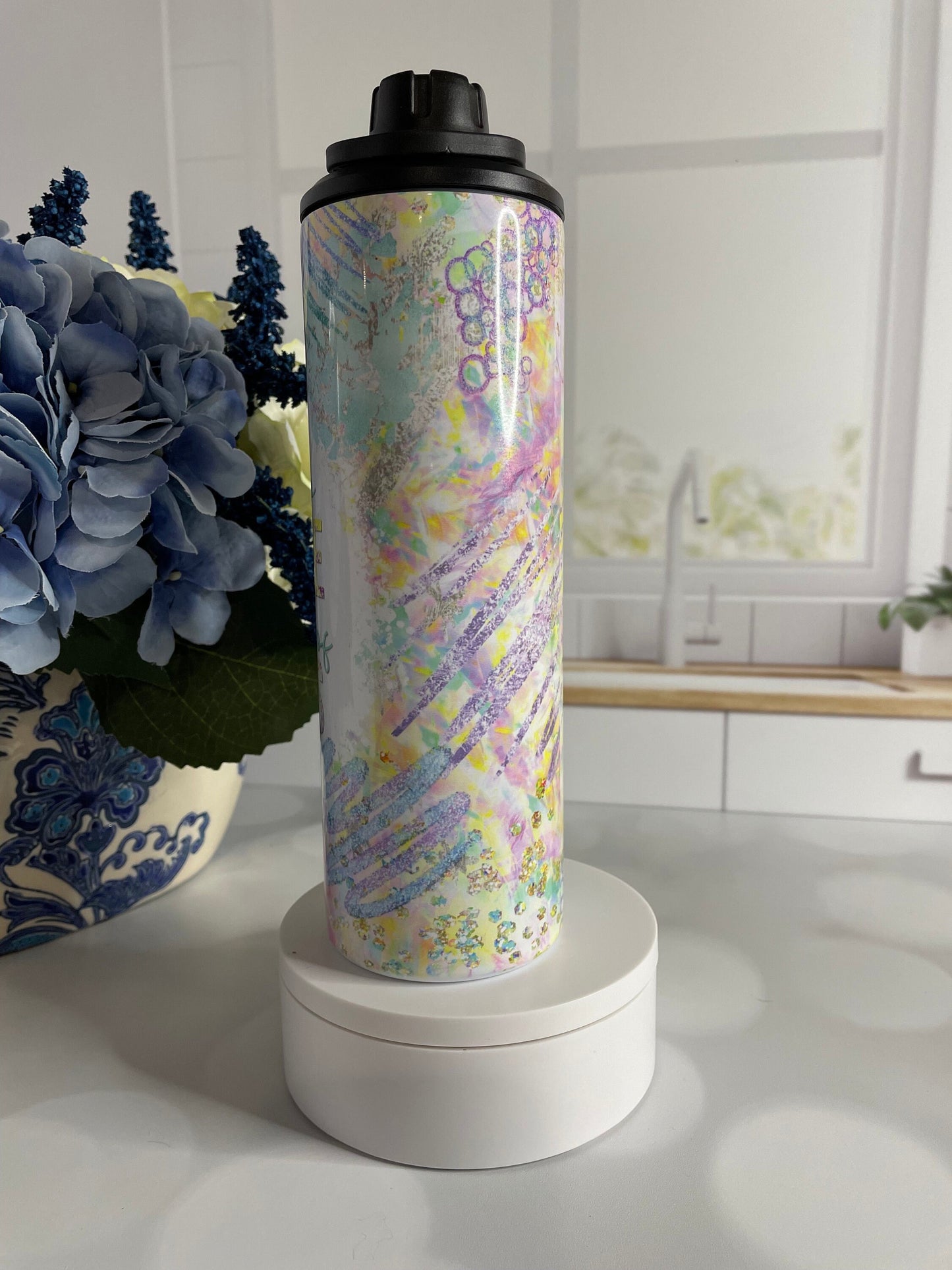 Stainless steel tumbler/ water bottle featuring pastel colors and coffee and chaos theme