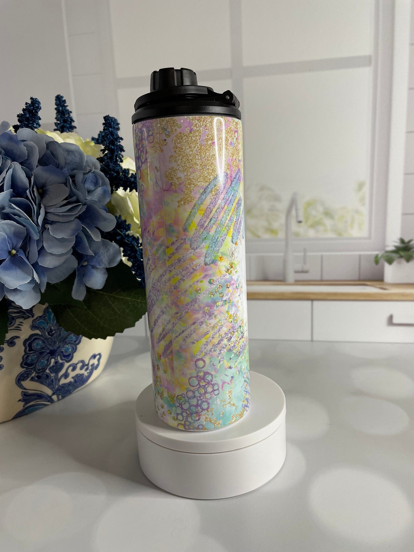 Stainless steel tumbler/ water bottle featuring pastel colors and coffee and chaos theme