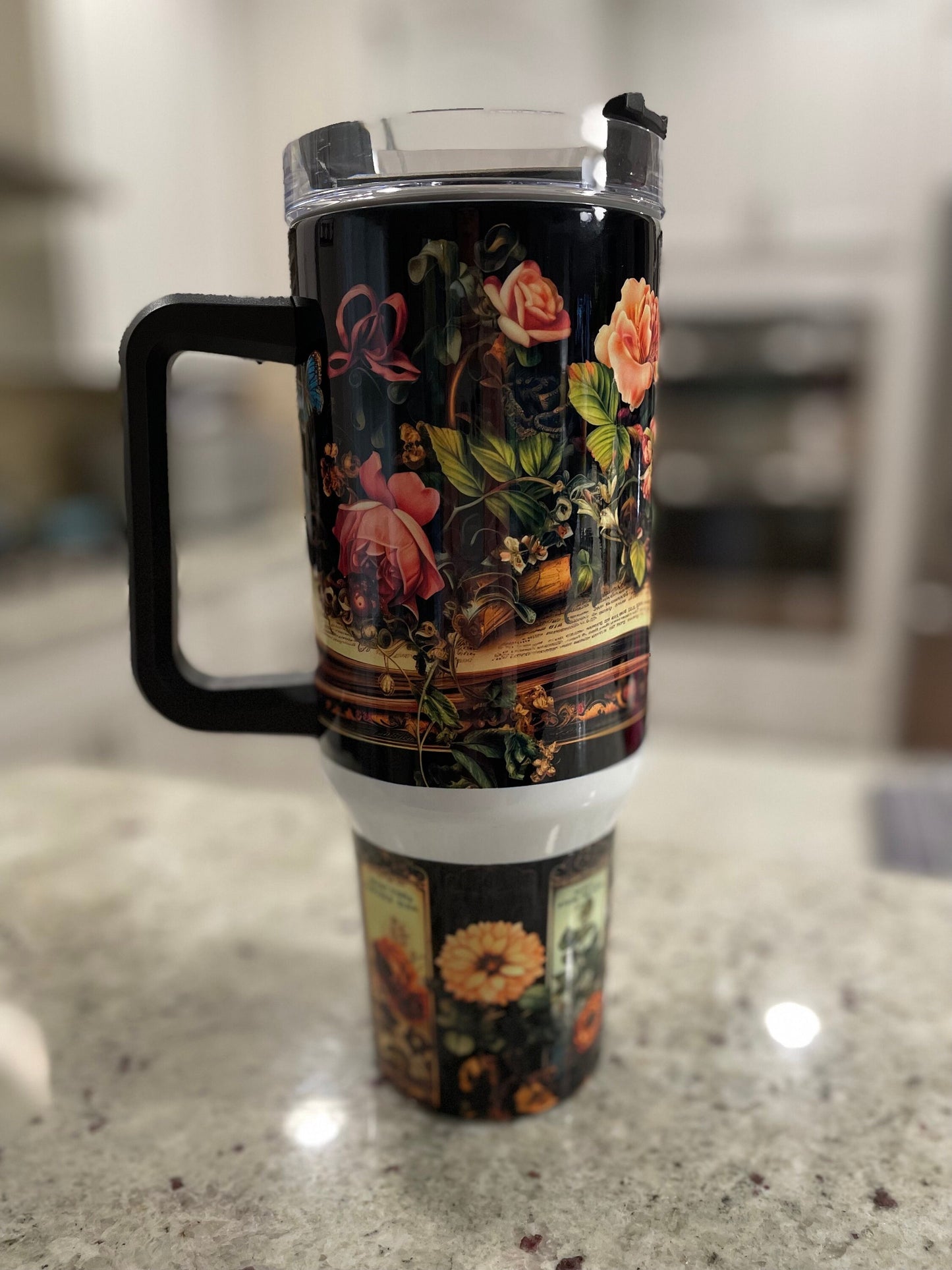 40 oz tumbler with handle | black background with vintage floral design