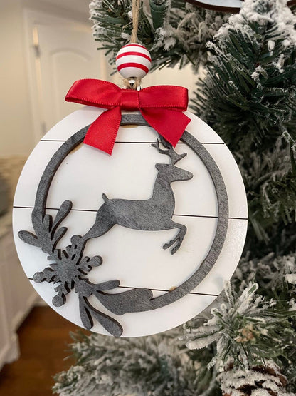 Farmhouse style Christmas ornament with deer on shiplap background