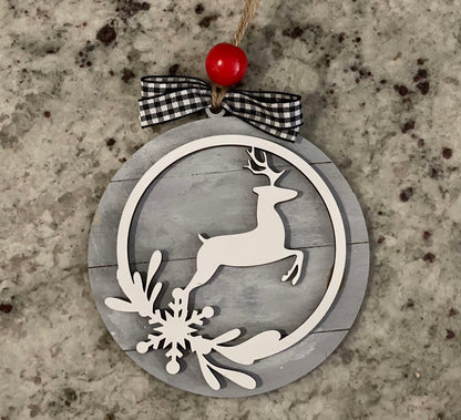 Farmhouse style Christmas ornament with deer on shiplap background