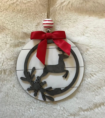 Farmhouse style Christmas ornament with deer on shiplap background