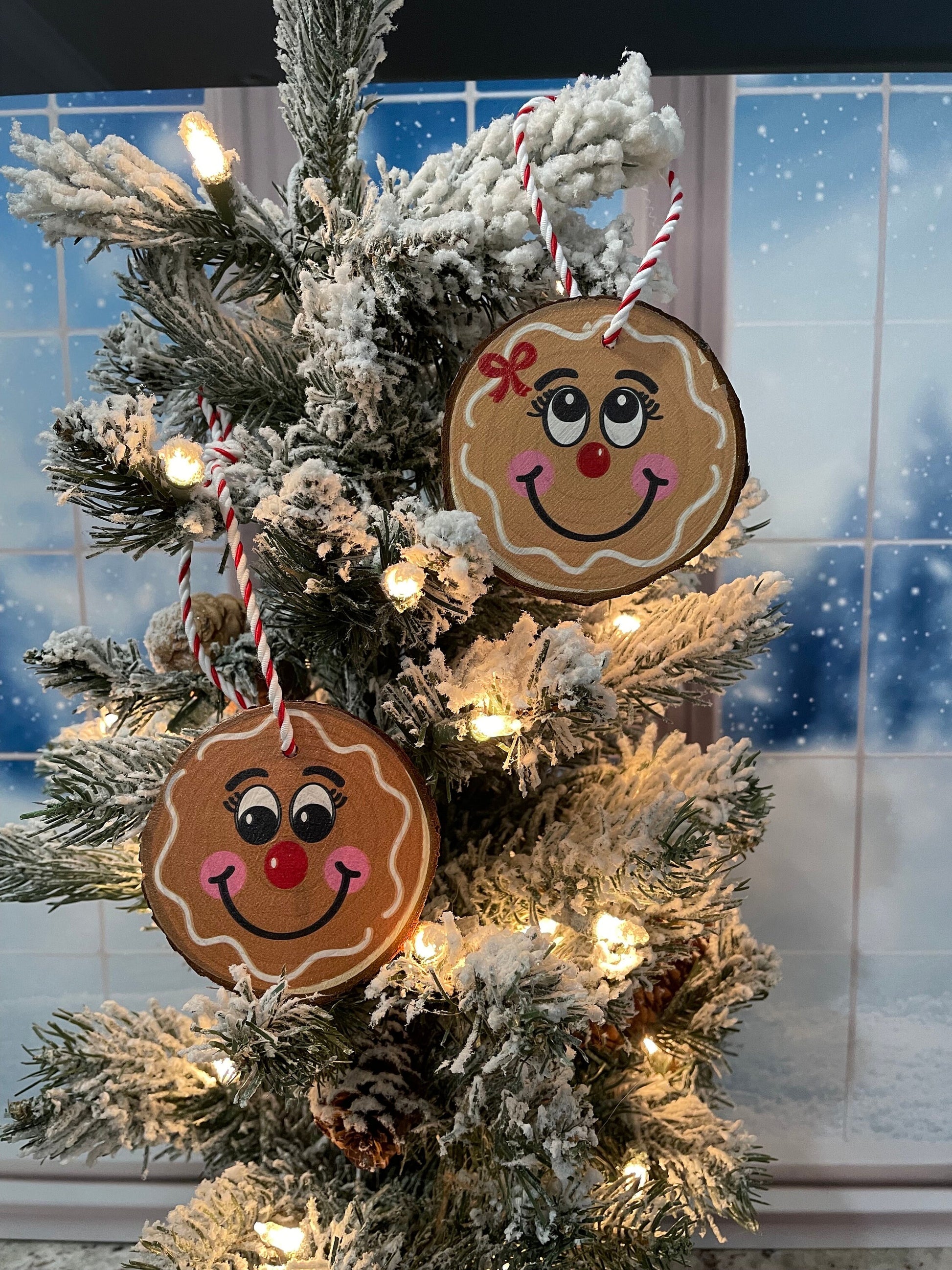 Gingerbread boy and girl ornaments on live edge wood slices