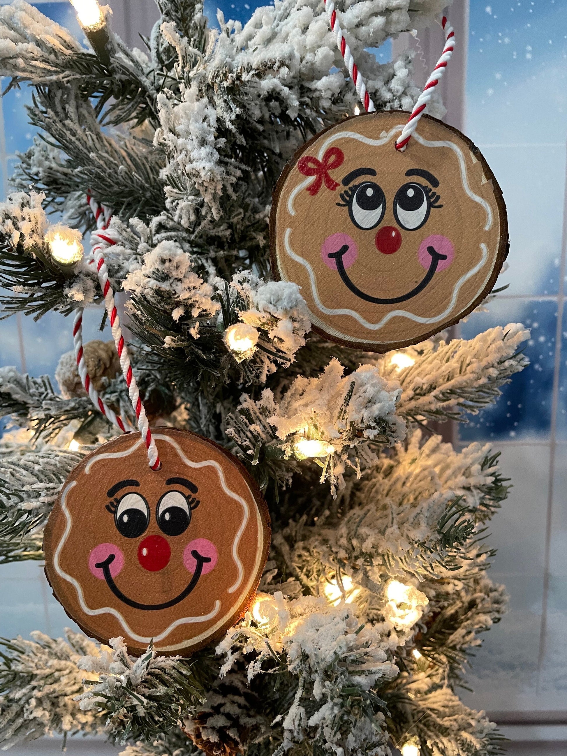 Gingerbread boy and girl ornaments on live edge wood slices