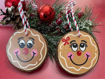 Gingerbread boy and girl ornaments on live edge wood slices